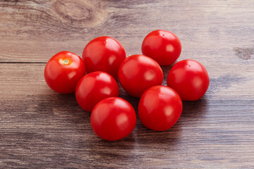 Ripe juicy cherry tomatoes heap