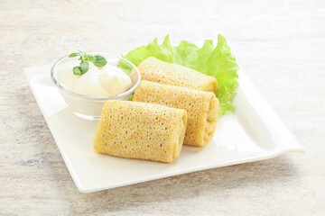 Stuffed pancakes with meat and cream