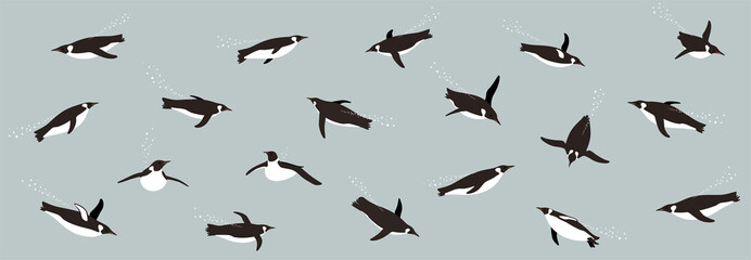 Many Emperor Penguins swimming in the sea with various postures.
