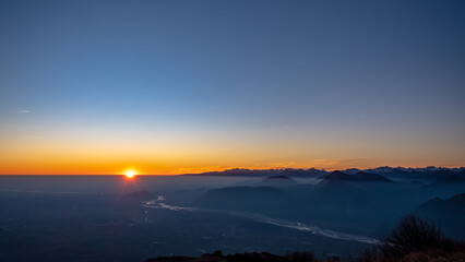 Winter sunset from an alpine peak of Friuli-Venezia Giulia