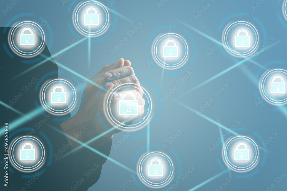 Poster businessman holds an open padlock icon on his palm.unlocking a virtual lock. business concept and te