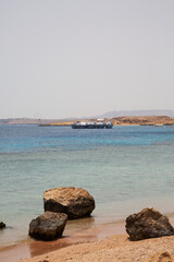 Fototapeta premium Yachts with tourists in a bay of the Red Sea, Sharm El Sheikh, Egypt