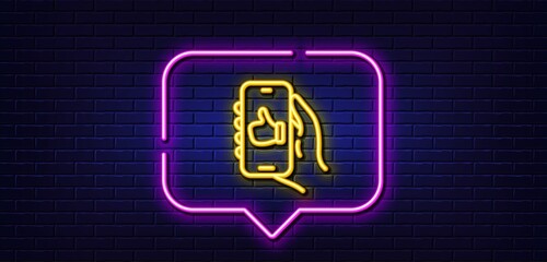 Neon light speech bubble. Like app line icon. Hand hold phone sign. Cellphone with screen notification symbol. Neon light background. Like app glow line. Brick wall banner. Vector