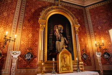 Fototapeta premium Becov nad Teplou, West Bohemia, Czech Republic, 14 August 2021: chateau and castle representative interior with baroque furniture, St. Peter´s chapel, blue dome with gold stars, carved gilded altar