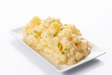 Tapa of aioli potatoes on white background