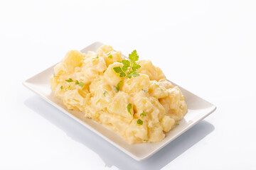 Tapa of aioli potatoes on white background