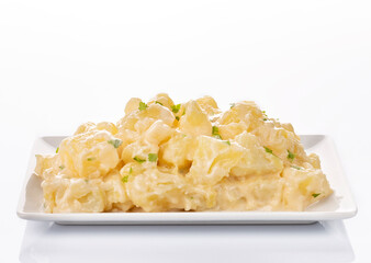 Tapa of aioli potatoes on white background