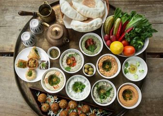 mixed middle eastern meze sharing food platter in turkish restaurant