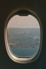 제주도가 보이는 비행기 창문 풍경