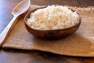 bowl of white rice on a burlap