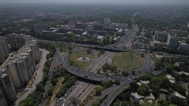 An aerial shot of the flyover with running traffic in New Delhi, India
