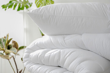 Stack of bedding on the background of the room