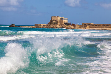 View of the ruins of the ancient port built by King Herod in ancient Caesarea, the building of a...