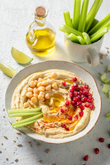 Delicious and homemade hummus as healthy and vegan snack.