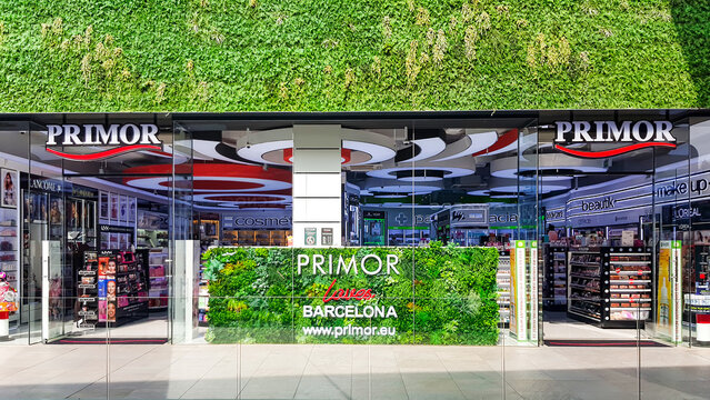 SPAIN, BARCELONA, MARCH, 2022 - Panorama of the green main entrance to the Primor Cosmetics store in Barcelona city, Spain. in Barcelona, Spain. Primor Cosmetics is a leading privately owned perfume a