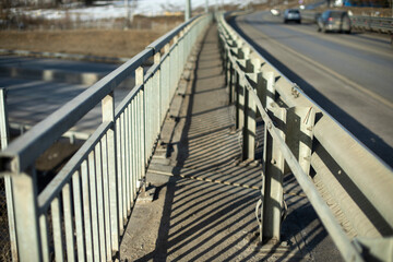 Road on bridge. Side of track. Highway details.