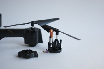 micro motor. disassembled drone motor on white background.