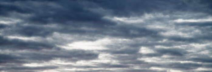 Fototapeta premium Bright clouds in the evening sky