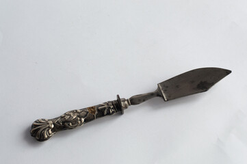 Antique silver knife with ornaments