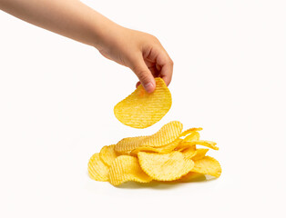 Hand holding potato chips isolated on a white background