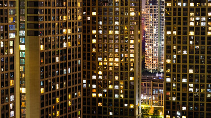 Fototapeta na wymiar Modern buildings with lights at night