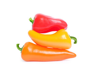 Pile of sweet multicolored peppers isolated on white background