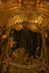 Centerpiece sculpture of the Baroque Capilla de San Benito at Jaen Cathedral, Benedict in dramatic...
