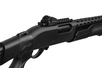 Pump-action 12 gauge shotgun isolated on a white back. Close-up shot of part of a shotgun. A...
