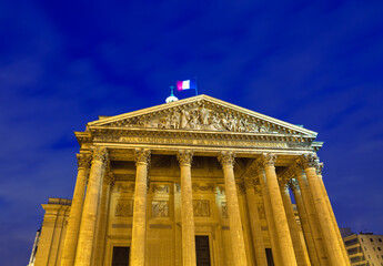 Obraz premium Pantheon in Paris illuminated in the night . 18th-century mausoleum with colonnaded facade