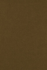 Dark brown colored paper texture. Textured surface with cellulose fibers. Vertical background. Cigar coloured wallpaper
