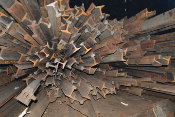 A mountain of cut rails in the factory shop