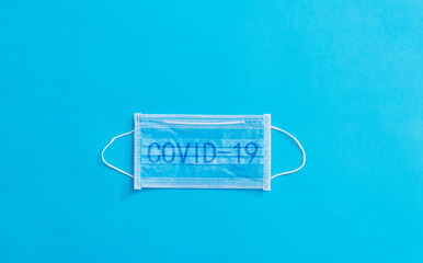Word COVID-19 writing on the medical mask