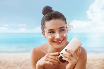 Beautiful Woman Applying on beautiful on Face. Sunscreen Solar Cream. Sun protection.The Girl Uses  Moisturizer Sunblock