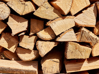 Chopped oak firewood neatly stacked