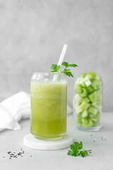 detox smoothie of celery and parsley in a tall glass