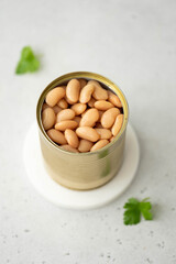 large white canned beans in a tin