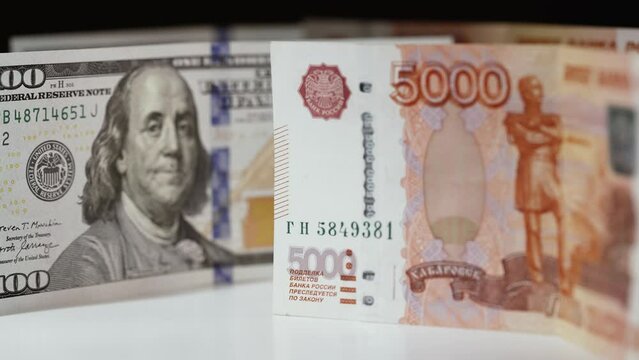 US Dollar and Russian ruble on the table