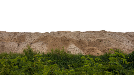 Isolate A landscape of large heaps of sandy soil.