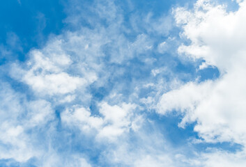 Abstract background of blue sky with white clouds.