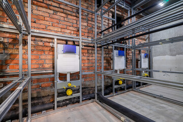 modern bathroom renovation. loft building. the toilet is being repaired.
