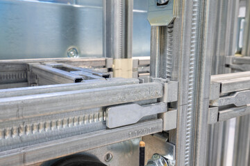 the process of plumbing installation. metal toilet seat mounts.