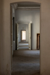 long corridor with arches in an old house in europe
