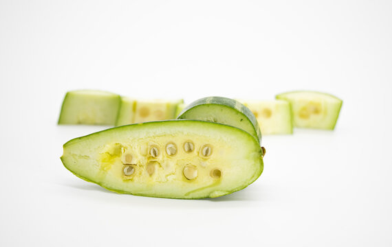 Sliced pointed gourds isolated on white background