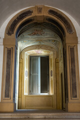 long corridor with arches in an old house in europe