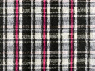 Checkered colored scarf background. Soft scarf with grunge striped checkered pattern.