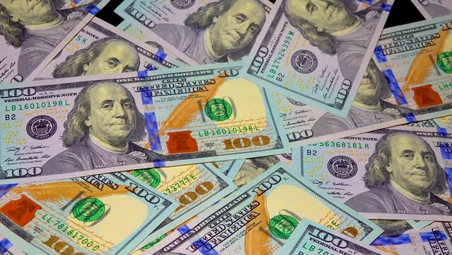 100 Dollar Bills, Portrait of president Benjamin Franklin on US dollar bills. Business concept