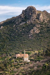 Fototapeta na wymiar The Couvent de Corbara, the ancient convent outside the village of Corbara in the Balagne region of Corsica with Cima di Sant'Angelo behind