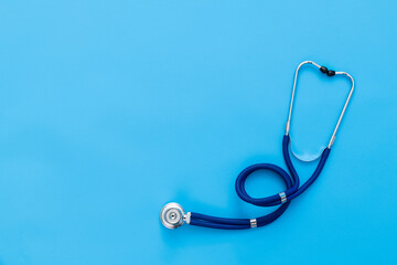 Close up of stethoscope on blue background
