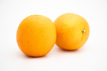 two Orange fruit isolate on white background, selective focus