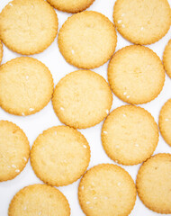 Fototapeta na wymiar Group of round crispy cookies isolated on white background. Sweet cookies.